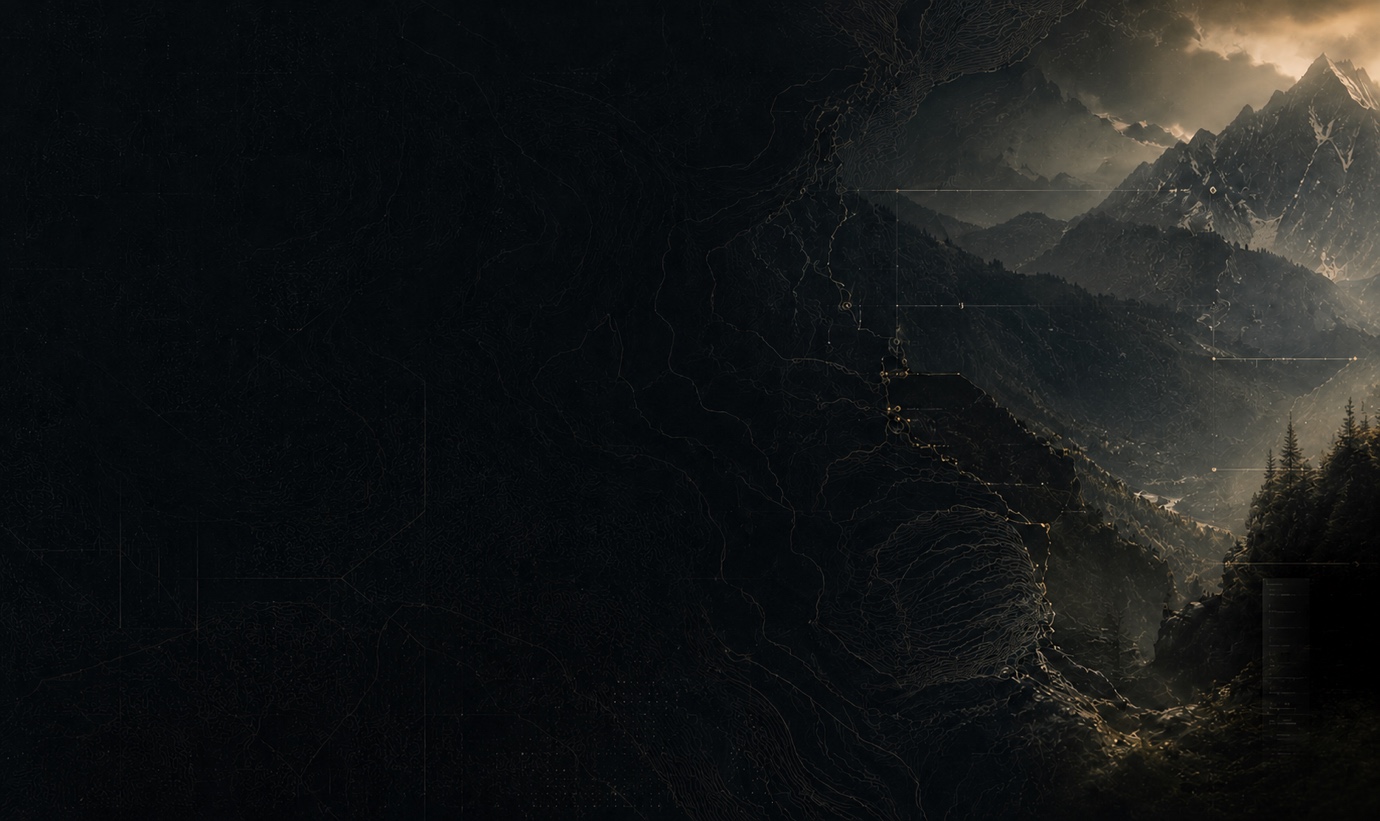 Light breaking across a rugged mountain landscape